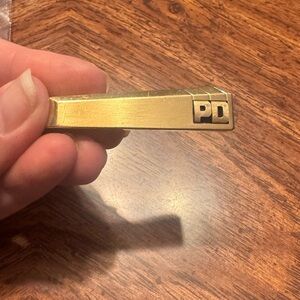 Gold Tone Tie Clip with 'PD' Logo